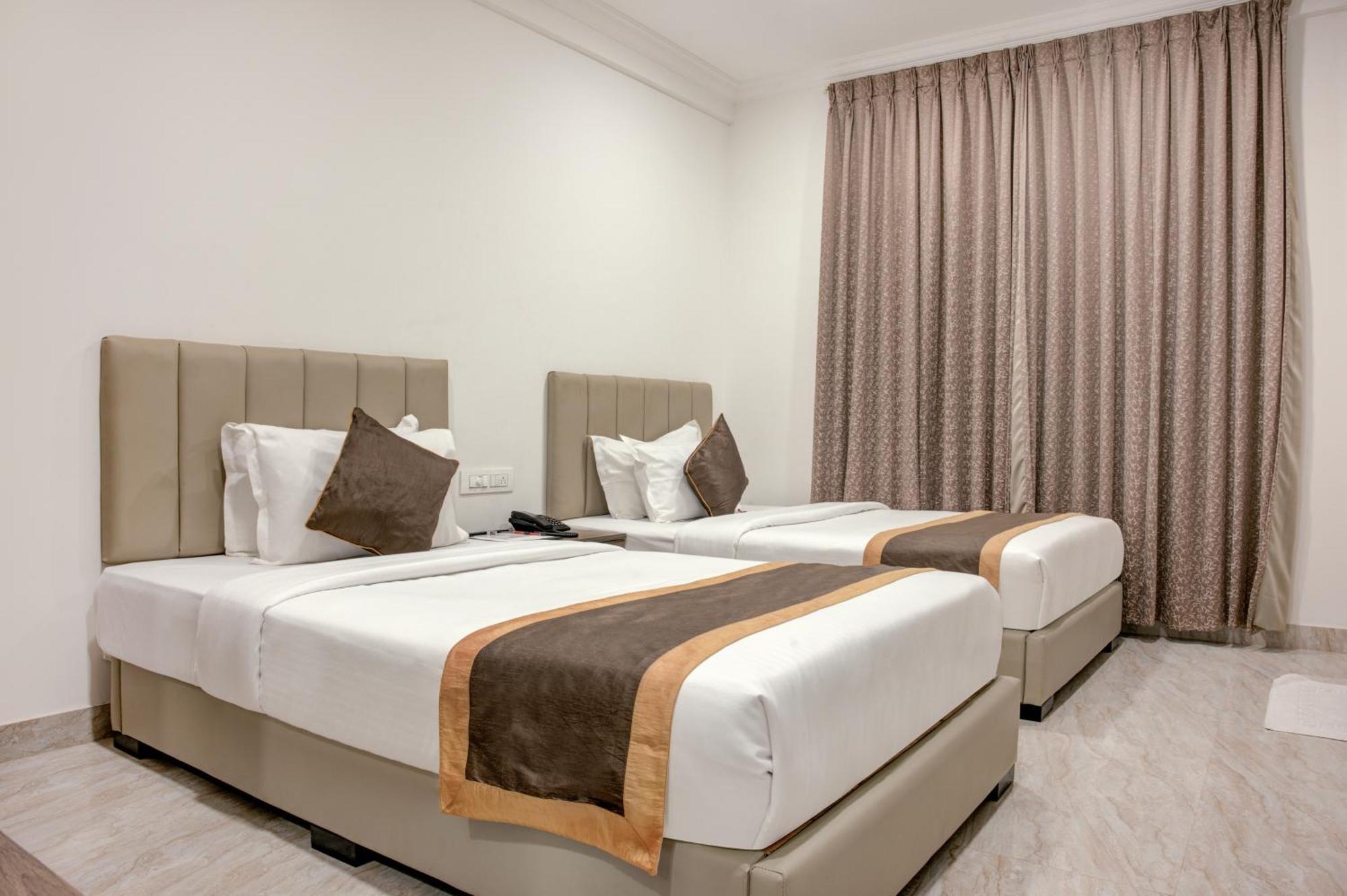 Hotel Sterling Inn Bangalore International Airport Yelahanka Extérieur photo